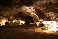 the cave is lit up with bright lights