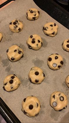 chocolate chip cookies on a baking sheet ready to go in the oven for bake