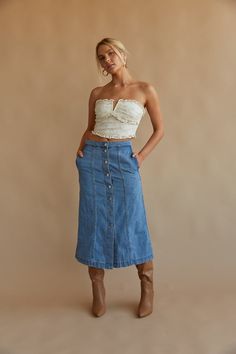 Stay on top of the trends in the Darby Button Up Denim Midi Skirt! This stylish skirt is made of a non-stretch denim and features a high waist and button up design. Pair with some trendy boots for the perfect fall look! Details 100% Cotton Double front pockets Button fly Hand wash cold / Hang dry Mid-rise Cotton Denim Skirt With Button Closure, Summer Straight Leg Skirt With Button Closure, Denim Blue Skirt With Button Closure, Denim Blue High Waist Skirt With Button Closure, High Waist Denim Blue Skirt With Button Closure, Spring Medium Wash Skirt With Button Closure, Medium Wash Skirt With Button Closure For Spring, Denim Mid-rise Skirt With Button Zip Fly, Denim Button Skirt For Summer