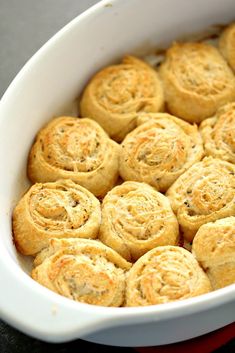 a casserole dish filled with cinnamon rolls