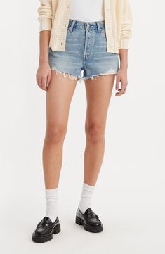 Distressed for the best, these high-rise cutoffs are made with nonstretch denim and the iconic 501 silhouette that's a must for warm weather. 2" inseam; 25" leg opening; 11" front rise; 16" back rise (size 29) Button fly Five-pocket style 100% cotton Machine wash, tumble dry Imported Summer Cutoff Rigid Denim Bottoms, Levi's Relaxed Fit Jean Shorts With Frayed Hem, Levi's High Rise Cotton Shorts, Mid-rise Rigid Denim Jean Shorts For Summer, Summer Mid-rise Rigid Denim Jean Shorts, Levi's Mid-rise Cotton Jean Shorts, Levi's Cutoff Cotton Shorts, Levi's Mid-rise Denim Blue Shorts, Levi's Cutoff Denim Blue Shorts