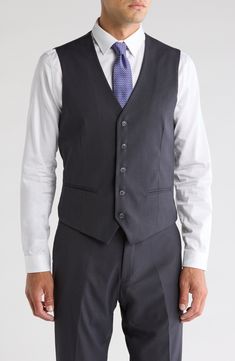 Bring understated elegance to the table in this three-piece suit crafted from rich fabric in a classic single-breasted silhouette. Jacket has notched lapels; chest welt pocket; front flap pockets Vest has front button closure; V-neck Pants have zip fly with button closure; front slant pockets; back button-welt pockets Jacket and vest are lined; trousers are lined to the knee 65% polyester, 35% viscose Dry clean Imported Suit has a 6” drop, meaning that a size 38R jacket is paired with size 32 pa Semi-formal Slim Fit Three-piece Suit With Single Button, Professional Single Breasted Three-piece Suit For Semi-formal Occasions, Formal Vest With Notch Lapel And Button Closure, Tailored Flat Front Suit With Button Closure, Tailored Button Closure Suit With Flat Front, Tailored Vest With Hidden Button Closure And Notch Lapel, Professional Three-piece Suit With Single-breasted Design, Formal Tailored Sets With Button Closure, Three-piece Suit With Button Closure For Work