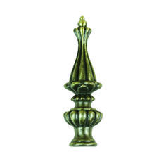 a green metal object is shown against a white background and has an intricate design on the top