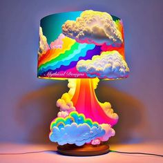 a colorful lamp with clouds and rainbows on it