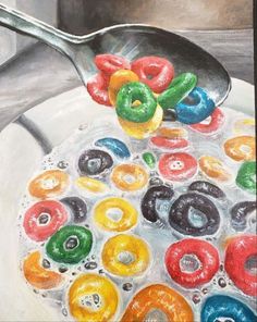 a painting of doughnuts in a bowl with a spoon