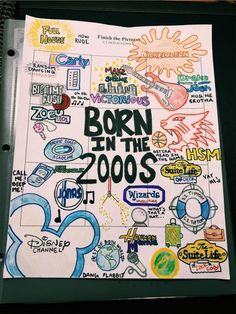 a notebook with the words born in the 2000's written on it and various stickers