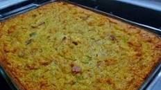 a casserole dish is being cooked in an oven