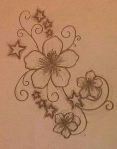 a drawing of flowers and stars on a sheet of paper