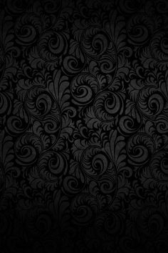 an abstract black background with swirls