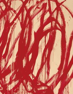 an abstract painting with red paint on it