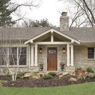 a house that is sitting in the grass