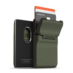 an open wallet case with a credit card slot in the front and back, sitting next to it