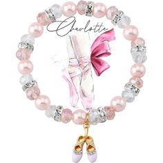 a beaded bracelet with pink and white pearls, ballet shoes and a charm that says charlotte