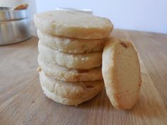 a stack of cookies sitting on top of a wooden table