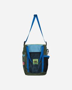 a green and blue bag hanging from the side