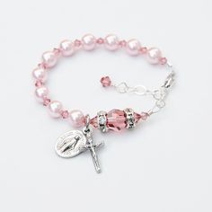 Baby Girl Baptism Rosary Bracelet - Light Pink Pearl and Blush Rose Swarovski Crystal -Personalized Initial - Catholic Christening Gift by RosariesOfLove on Etsy Elegant Adjustable Pink Rosary Bracelet, Elegant Pink Adjustable Rosary Bracelet, Elegant Pink Rosary Bracelet For Wedding, Elegant Pink Wedding Rosary Bracelet, Adjustable Pink Rosary Bracelet For First Communion, Personalized Pink Rosary Bracelet For Baptism, Adjustable Pink Jewelry For Baptism, Pink Beaded Jewelry For First Communion, Elegant Pink Bracelets For First Communion