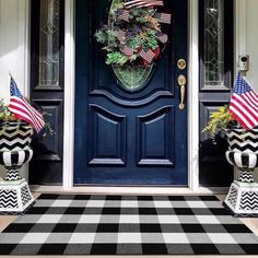 the front door is decorated with patriotic decorations