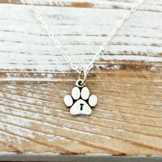 Paw Print Necklace. Pet jewelry - gift for her - cat lady - dog lover - dog person - pet necklace - animal - fur baby - sterling silver by JustJaynes on Etsy https://www.etsy.com/listing/106228363/paw-print-necklace-pet-jewelry-gift-for Necklace Paw Print, Silver Jewelry With Paw Print For Personalized Gift, Silver Necklace With Paw Print For Gift, Silver Paw Print Jewelry For Personalized Gift, Personalized Silver Jewelry With Paw Print, Paw Print Pendant Necklace For Gifts, Dog Paw Pendant, Paw Print Pendant, Silver Pendant Lighting