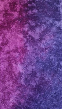 a purple and pink background with some black spots