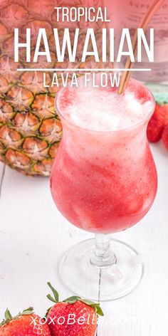 tropical hawaiian lava flow with strawberries and pineapples in the background, on a white wooden table