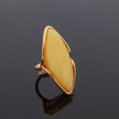 Introducing Our Beautiful, Handmade Natural Baltic Butterscotch Amber Adjustable Ring. This Unique Statement Piece Is Crafted From 14k Gold Plated 925 Sterling Silver And Features Beautiful Swirls Of White, Making It Truly One-Of-A-Kind. Its Adjustable Size Ensures A Perfect Fit Every Time. Dimensions: 39.5mm X 16.3mm Band Width: 2.5mm Total Weight: 11.68g Handmade In Poland Classic Gold Jewelry With Baltic Amber, Classic Baltic Amber Gold Jewelry, Modern Yellow Baltic Amber Jewelry, Elegant Handmade Yellow Rings, Luxury Handmade Yellow Rings, Classic Handmade Yellow Jewelry, Elegant Yellow Baltic Amber Jewelry, Ring Handmade, Adjustable Ring