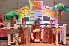 an image of a beach party setting with palm trees and decorations on the stage set