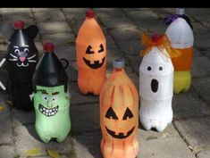 halloween bottles are lined up on the ground