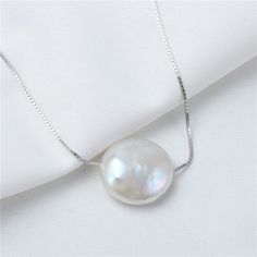 "12-15mm Large Coin Pearl Pendant for sale! It's single floating pearl pendant. Very good daily ornament for Summer! Pearl Type: Chinese Cultured Freshwater Pearl Pearl Size:12-15mm Pearl Shape: Coin Pearl Grade:AAA Pearl Color: Natural White Findings:925 silver Chain Type: 925 silver Box Chain Length:18\" 1.Here is the link of matching COIN PEARL Earrings : https://www.etsy.com/listing/453226164/12-15mm-big-coin-pearl-earringsirregular?ref=shop_home_active_1 2.Here is the link of coin pearl bea Mother's Day Pearl Charm Jewelry, Mother's Day Round Pearl Charm Jewelry, Mother's Day Round Pearl Drop Necklaces, Pearl Necklace With Round Pearl Charm Pendant, White Gold Pearl Necklace With Round Beads Pendant, Pearl Drop Round Necklace, Pearl Drop Necklace With Round Pearls, Mother's Day Pearl Necklace With Pearl Pendant, Mother's Day Pearl Necklace With Round Pendant