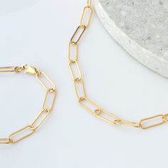 "Beautiful dainty chain bracelet in 14K gold or sterling silver. Our delicate bracelets are offered in three unique styles: X-Large Paperclip, Medium Paperclip or Oval Link Chain. Pick one or more for a custom layering look just for you! *listing is for ONE delicate bracelet in chain of your choice D E T A I L S * choice of chain: X-Large Paperclip, Medium Paperclip or Oval Link Chain * 100% 14K gold fill or sterling silver chain and findings * spring clasp closure * Made in USAhandmade with lov Paperclip Bracelet, Bracelet Dainty, Dainty Chain, Chain Extenders, Mom Necklace, Layered Bracelets, Bracelets For Women, Unique Styles, Bracelet Gold