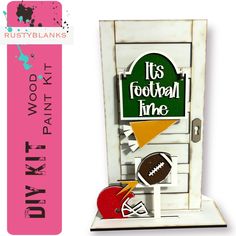 this is an image of a wooden door with football themed items on it and the words its football time