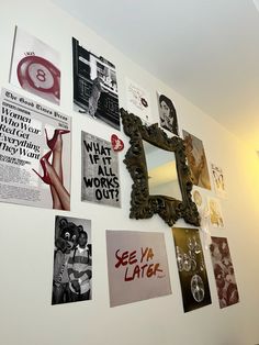 a wall with many different posters on it