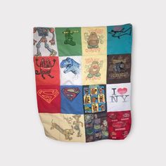 a multicolored blanket with cartoon characters on it