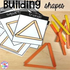 building shapes made out of pops sticks on a table with text overlay that says building shapes