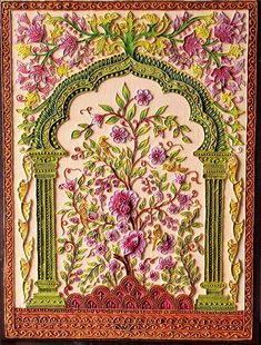 an intricately decorated wall hanging with flowers