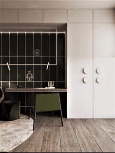 a black and white bathroom with wood flooring