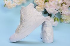 "All orders for trainers / sneakers to USA/Canada will be delivered in 2-4 business days after production without extra costs Made with love for your wedding day by Lovin Bridal - More Wedding shoes at our shop : http://lovincollection.etsy.com It's the bride's prerogative to wear the comfiest bride shoes. If you're set on heels then one option is to have your Lace Wedding Converse trainers as a second pair of bridal shoes to change into for the reception. There are so many options for your wedd White Round Toe Sneakers For Bridal Shower, Spring Wedding Sneakers With Round Toe, White High-top Sneakers For Wedding, Spring Wedding High-top Sneakers, Customized Converse, All White Converse, Bride Converse, Custom Converse Shoes, Bride Sneakers