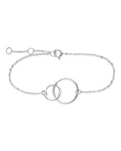 Looking for a delicate accessory that you can add to any outfit? This sterling silver interlocking circle bracelet, which is available in gold, silver, or rose gold tones, is the perfect addition to any flirty and feminine look. Adjustable in length to ensure the perfect fit. Materials: 14K gold vermeil, 14K rose gold vermeil, or sterling silver Features: Measures 6" with 1" extender, 10mm & 15mm interlocking circles, Lead & Nickel free, spring ring clasp Elegant Adjustable Circular Chain Bracelet, Elegant Sterling Silver Circle Bracelets, Starfish Bracelet, Trending Bracelets, Black Onyx Bracelet, Circle Bracelet, Forever Jewelry, Buckle Bracelet, Onyx Bracelet