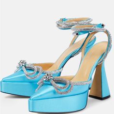 Original Price $1025 Double Bow Platform Pumps From Mach & Mach Are Destined For Special Occasions. Made From Lustrous Blue Satin, The Glamorous Style Features A Crystal-Embellished Double Bow And Coiled Ankle Straps. * Closure: Buckle-Fastening Ankle Strap * Lining: Leather * Sole: Leather Insole And Sole * Toe Shape: Pointed Toe * Upper: Satin * Comes With Dust Bags * Comes With A Box * Made In Italy * Item Number: P00730828 Size And Fit * True To Size * European Sizes * 13,5cm-5.5" Heel (Size Blue Embellished Heels For Special Events, Embellished Blue Heels For Gala, Blue Embellished Heels For Gala, Luxury Blue Heels With Rhinestones, Luxury Rhinestones Heels For Reception, Glamorous Embellished Blue Heels, Glamorous Blue Embellished Heels, Glamorous Blue Evening Heels, Elegant Light Blue Party Heels