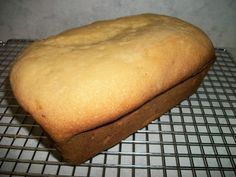 a loaf of bread sitting on top of a cooling rack