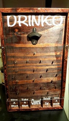 an old wooden cabinet with metal knobs on the front and bottom doors, has several holes in it