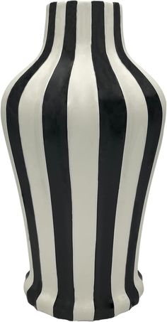 a black and white striped vase is shown