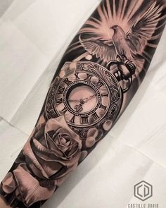 an arm with a clock and roses on it