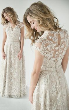 a woman in a wedding dress looking at her reflection