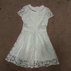 Nwot White Sheer Dress With Flower Embroidery. Very Well Made, No Tags From Sample Line. Fully Lined, Short Sleeve, Full Skirt, Above Knee, Back Zipper Closure. Fits Like Small/Medium. No Stretch. See Measurements. Length 34" Shoulder To Shoulder 14" Armpit To Armpit 17" Waist 13.5" White A-line Mini Dress With Floral Embroidery, White Knee-length Lace Dress With Floral Embroidery, White Casual Lace Dress With Short Sleeves, Casual White Lace Dress With Short Sleeves, White Floral Embroidered Short Sleeve Mini Dress, White Embroidered Short Sleeve Party Dress, White Short Sleeve Embroidered Party Dress, White Floral Embroidery Mini Dress With Short Sleeves, White Embroidered Short Sleeve Dress For Party