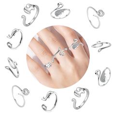 several rings with different shapes and sizes are shown in front of a white background, including one