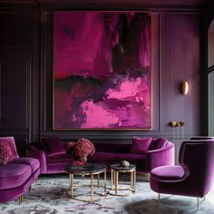 a living room filled with purple furniture and a painting on the wall above it's couches