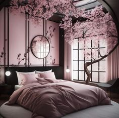 a bed sitting under a window next to a pink flowered tree in a bedroom