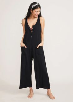 The only thing better than a jumpsuit is a nursing-friendly one in super duper soft cotton. With a pretty pointelle pattern, easy feeding access, and front patch pockets for stashing a buncha stuff in, you’ll never want to take it off. So go ahead: feed in it, sleep in it, run errands in it...get crazy. ﻿Details: 100% CottonCare: Machine Wash Cold Gentle Cycle, Do Not Bleach, Tumble Dry, Warm IronMade In India Maternity Pajamas, Pocket Jumpsuit, Maternity Jumpsuit, Cotton Jumpsuit, Nursing Friendly, Maternity Nursing, Casual Jumpsuit, Clothing Essentials, Black Jumpsuit