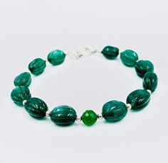 Natural Zambian Emerald Beads Bracelet, Unique Handmade Bracelet, Top Quality Emerald Oval Beaded Bracelet, Birthstone Jewelry Gift : BRACELET DETAILS : Gemstone -- Emerald Style -- Bracelet Color -- Green Beads Size --- 10X7X6 To 11X10X7 MM Approx. Finish -- Gold and Silver Shape -- Oval Grade -- AAA Bracelet Length -- 5 To 9 Inch External length --- 1 inch Free Size Adjustable Shipped - India HANDMADE JEWELRY We are wholesaler manufacturer and exporter of Loose Gemstone, Necklace, Pendant, Bra Luxury Green Polished Bead Bracelets, Green Polished Bead Bracelet, Nature-inspired Green Round Bead Bracelets, Hand-strung Green Beaded Bracelets, Green Amazonite Hand-strung Bracelets, Emerald Style, Emerald Bead, Zambian Emerald, Green Bead