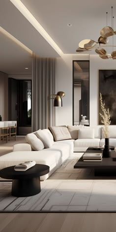 a living room with white couches and black coffee table in the center, large painting on the wall